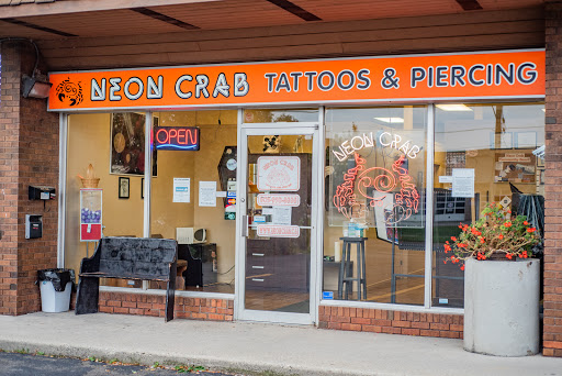 Neon Crab Tattoos & Piercing