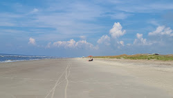 Photo de Caswell beach avec rivage droit, long