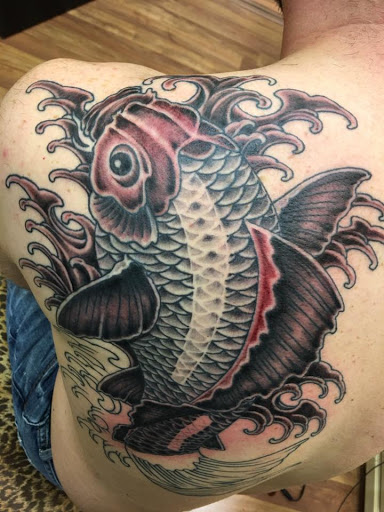 Explore chest tattoo ideas for guys, creative tattoo ideas in Manassas, available at Exposed Temptations Tattoo