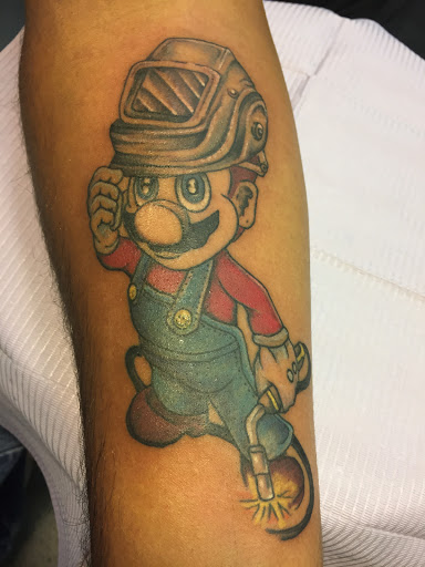 Explore wing tattoo ideas for guys, creative tattoo ideas in Brunswick, available at Blue Fin Tattoos