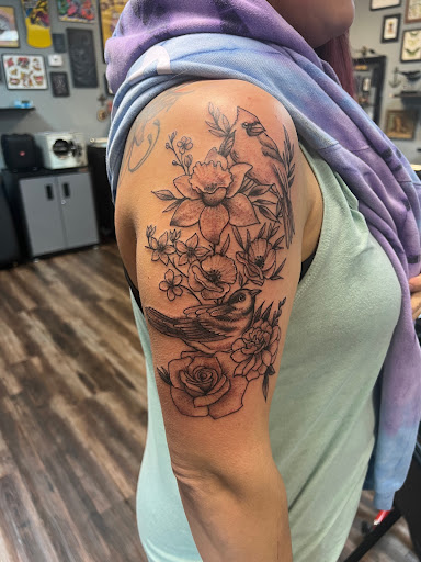 Explore arm tattoos for women ideas, creative tattoo ideas in Nazareth, available at Nocturnal Tattoo