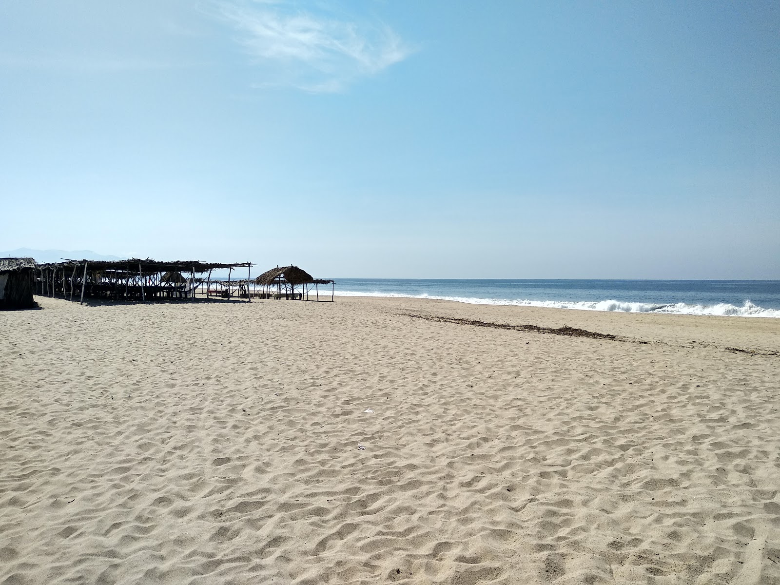 Foto di Playa Barra de Coyuca con costa lunga e dritta
