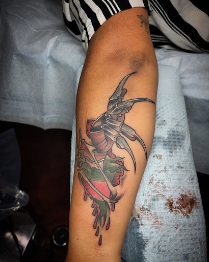 Explore man hand tattoo ideas, creative tattoo ideas in Libertyville, available at Lucky Seven Tattoo