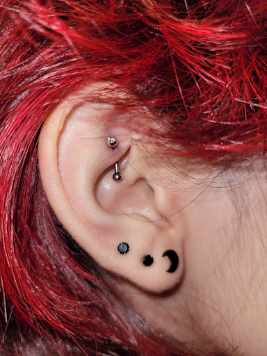 Explore traditional hand tattoo ideas, creative tattoo ideas in Mckinney, available at The Magic Needle Piercing Studio