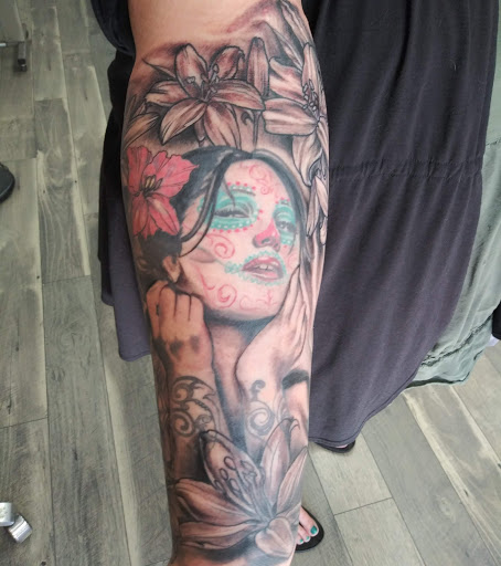 Explore thigh tattoo ideas for men, creative tattoo ideas in Coeur D Alene, available at Inkworld Tattoo