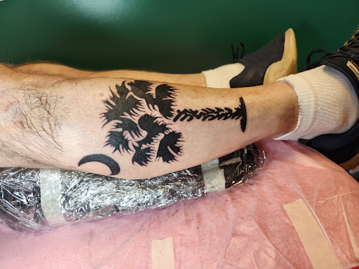 Explore breastfeeding tattoos ideas, creative tattoo ideas in Spartanburg, available at The Gallery Tattoo Shop Spartanburg