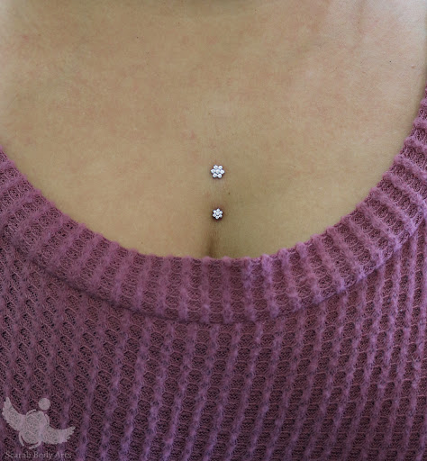 Explore hour glass tattoo ideas, creative tattoo ideas in Syracuse, available at Scarab Body Arts