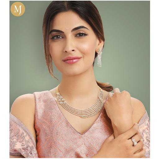 Jeweler «Malani Jewelers, Tampa FL - 22Kt Gold & Diamond Jewelry», reviews and photos, 2367 E Fowler Ave, Tampa, FL 33612, USA