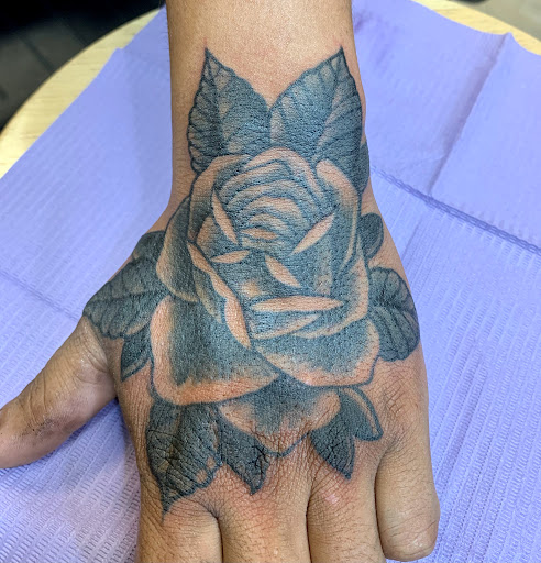 Explore october birth flower tattoo ideas, creative tattoo ideas in Brunswick, available at Blue Fin Tattoos