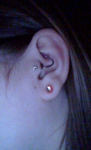 Explore thigh tattoo ideas men, creative tattoo ideas in Green Bay, available at Colourbox Body Piercing Llc