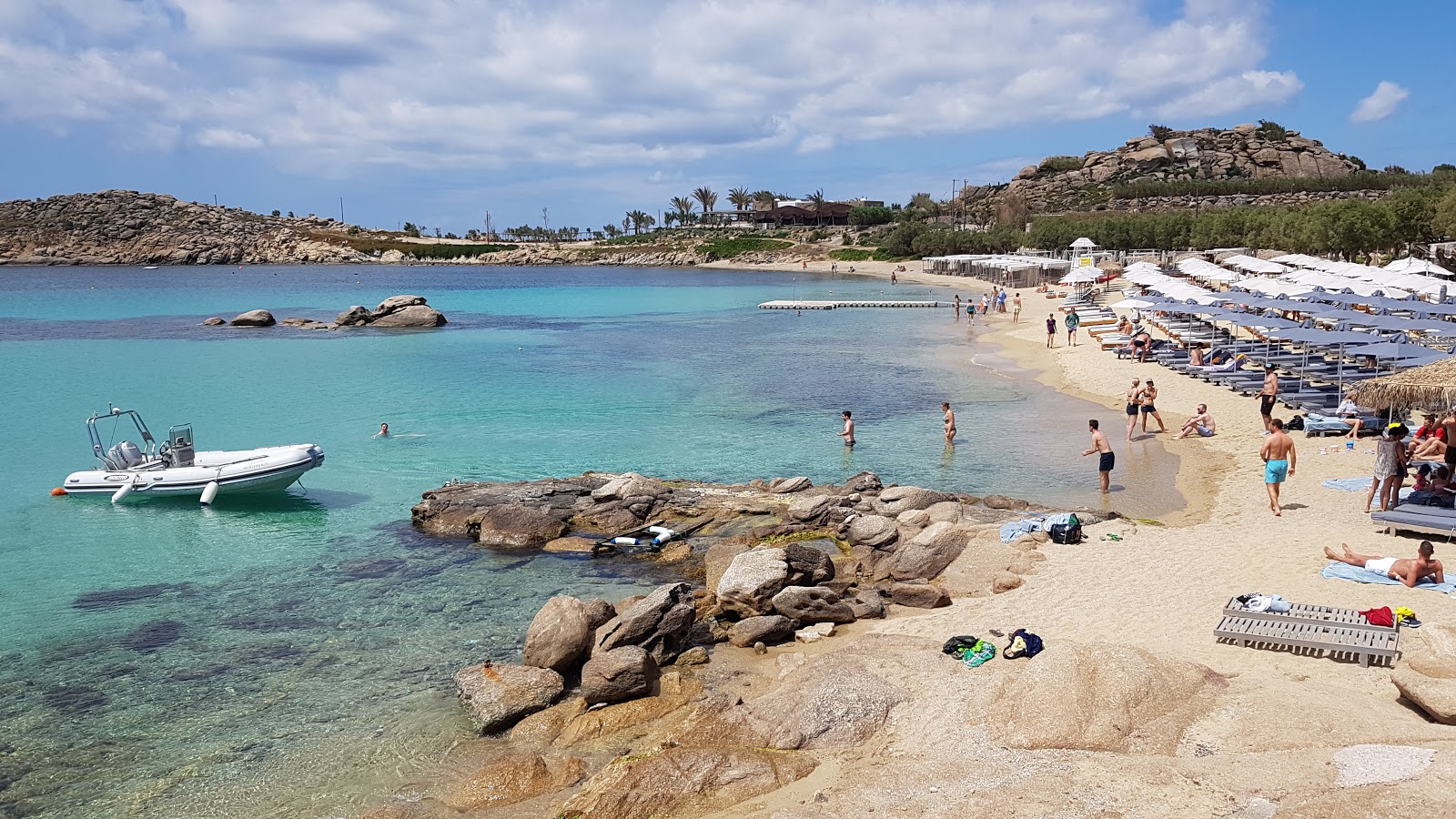 Foto de Praia de Paraga com areia brilhante superfície