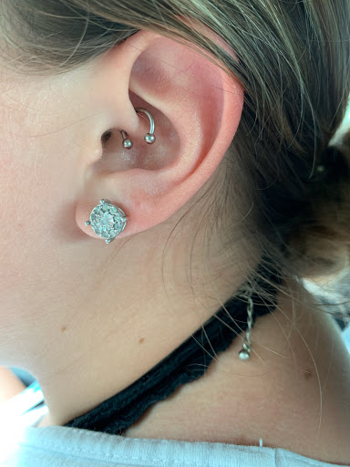 Find inbetween boob tattoo ideas for your next unique tattoo in Myrtle Beach at Pitbull Tattoo and Piercing Clinic