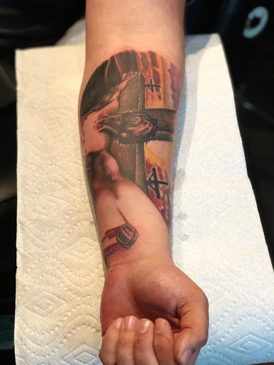 Explore forearm tattoo name ideas, creative tattoo ideas in Kingsford, available at Deft Tattoo Studio