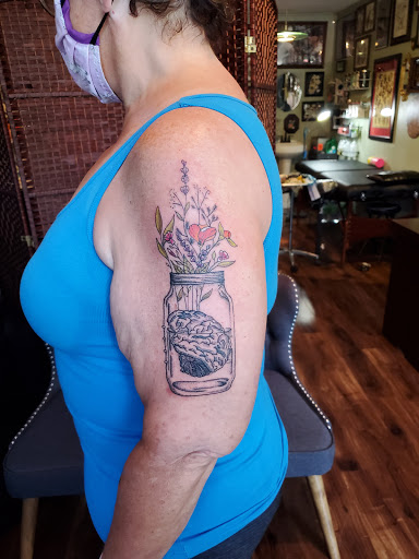 Explore cruise ship tattoo ideas, creative tattoo ideas in Lawrence, available at Standard Electric Tattooing