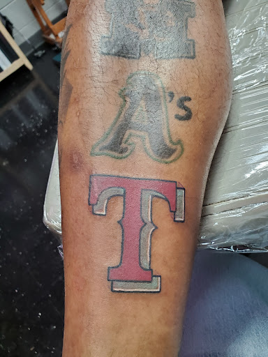 Explore tattoo ideas for mechanics, creative tattoo ideas in Newport, available at Mutiny Tattoo Co. LLC