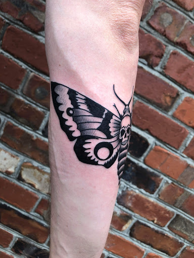 Explore tattoo cuff ideas, creative tattoo ideas in Fayetteville, available at American Tattoo Society of Fayetteville