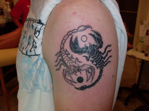 Explore tribal cross tattoo ideas, creative tattoo ideas in Bridgeport, available at Pike Street Studios Tattoo and Body Piercing