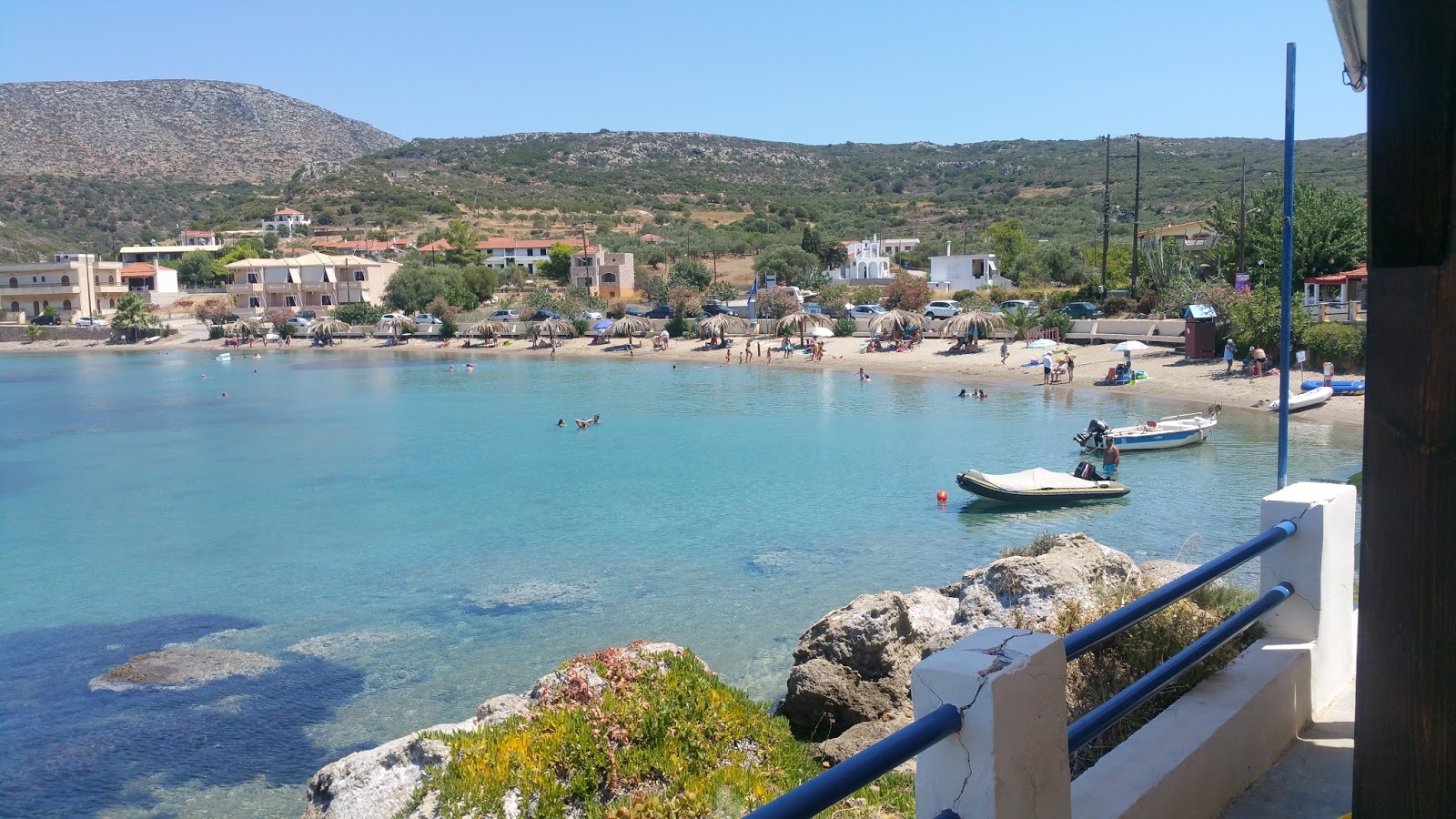 Foto von Archangelos beach mit beiger sand Oberfläche