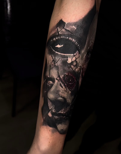 Explore gory tattoo ideas, creative tattoo ideas in Fort Wayne, available at Grade A Tattoos and Body Piercing