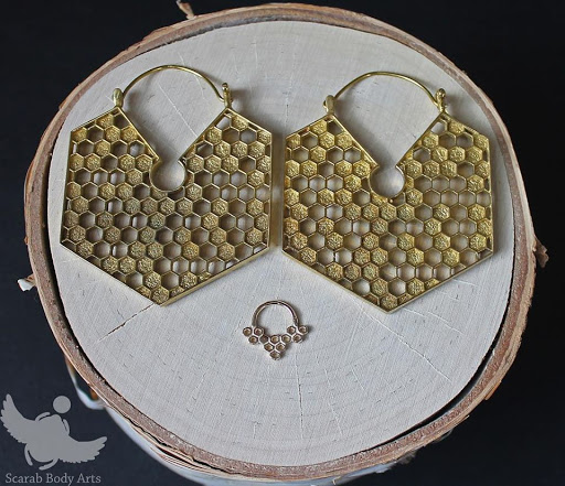 Find tattoo ideas snake for your next unique tattoo in Syracuse at Scarab Body Arts