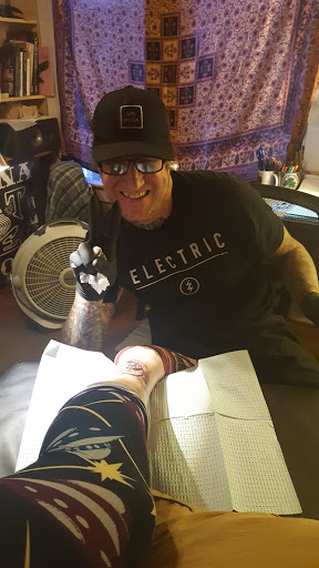 Explore rock tattoo ideas, creative tattoo ideas in Saint Augustine, available at Ms. Deborahs Fountain of Youth Tattoo & Body Piercing