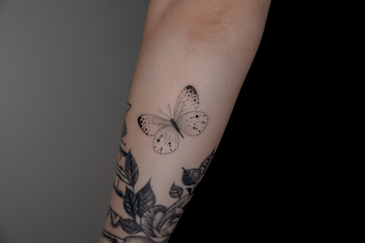 Explore cleavage tattoo ideas, creative tattoo ideas in New York, available at UPLIFT TATTOO & PIERCING NYC