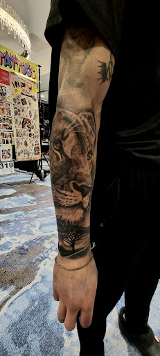 Explore floral tattoo sleeve ideas, creative tattoo ideas in South Saint Paul, available at Kingdom Ink Studio