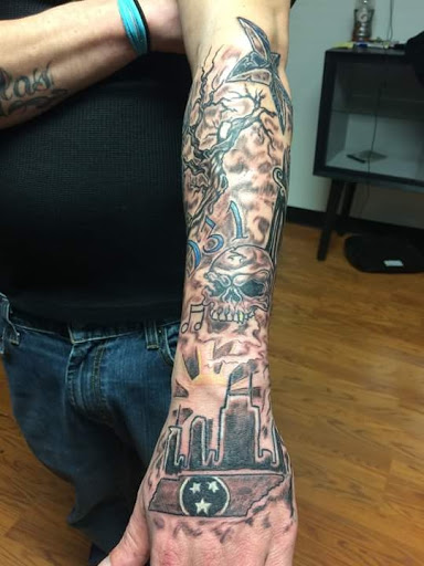 Tattoo Shop «Evil ink tattoo & piercings smokeshop», reviews and photos, 109 Hot Wheels Ln, McMinnville, TN 37110, USA