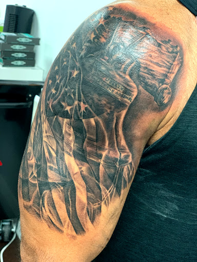 Explore dinosaur tattoo ideas for son, creative tattoo ideas in Fontana, available at Iconiq Tattoo Studio