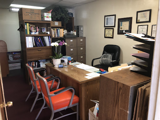 R T KINDOM,EA Income Tax & Realty