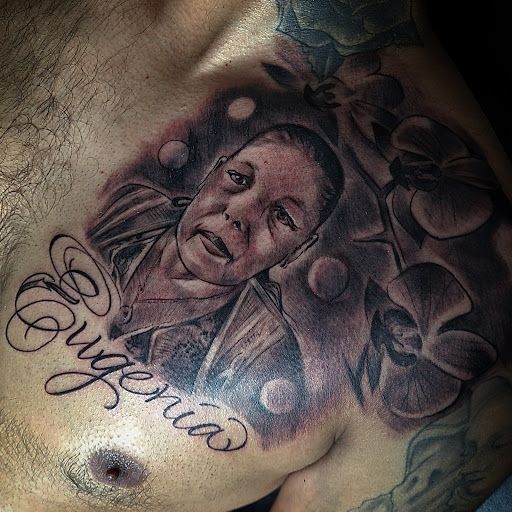 Explore native american tattoo ideas for men, creative tattoo ideas in Corning, available at Prisma Ink Tattoos & Piercings