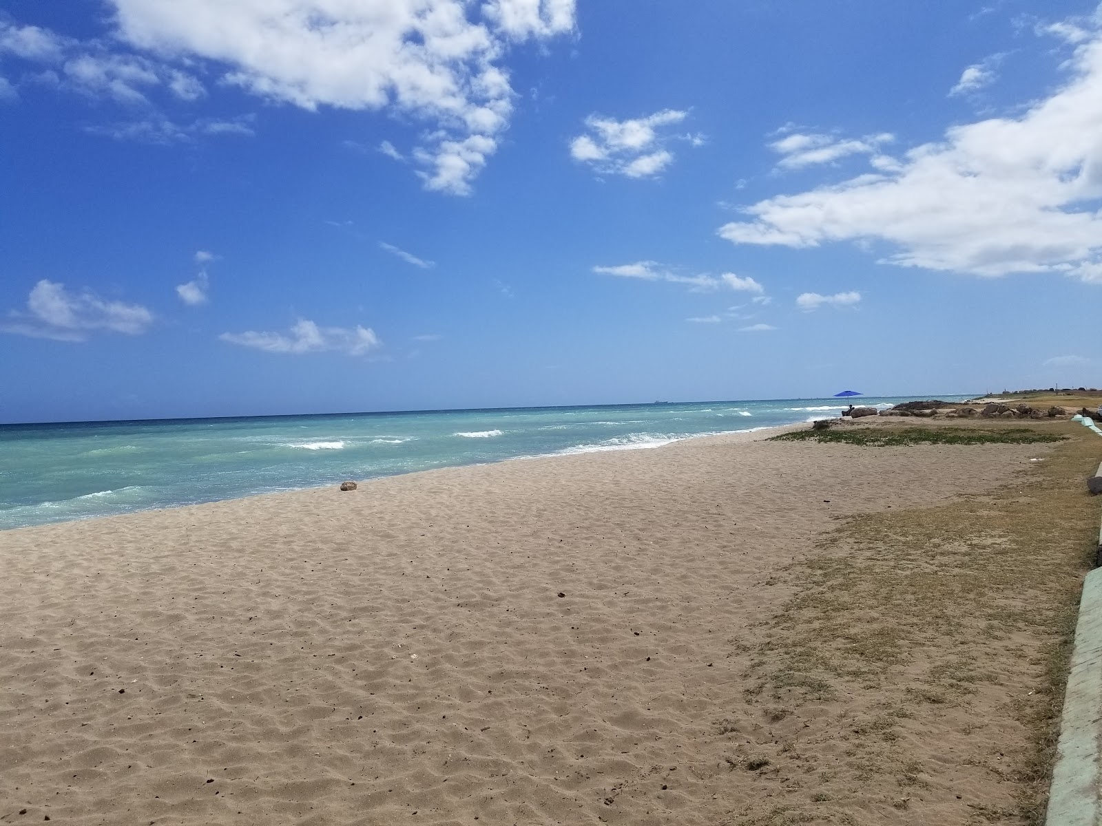Foto van Ula'Ula Beach met turquoise puur water oppervlakte
