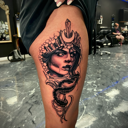 Explore tombstone tattoo ideas, creative tattoo ideas in Mesa, available at Next Wave Tattoos and Piercings