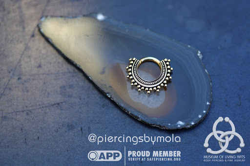 Explore tattoo ideas generator, creative tattoo ideas in Charleston, available at MOLA Piercing and Fine Jewelry