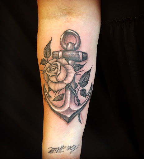 Find space tattoo ideas for your next unique tattoo in Peoria at Freedom Ink Tattoos
