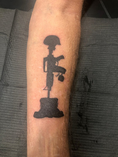 Explore cover up black tattoo ideas, creative tattoo ideas in Florence, available at West Coast Tattoo & Body Piercing