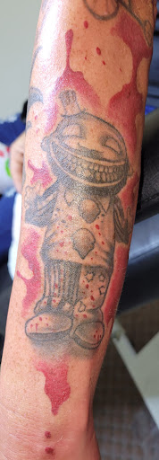 Explore matching tattoo ideas for brothers, creative tattoo ideas in Angola, available at Hoodlum Ink