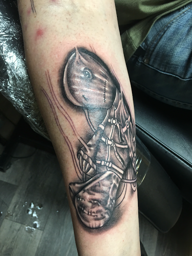 Explore golf ball tattoos ideas, creative tattoo ideas in Warner Robins, available at Untold Pain Tattoo Studio
