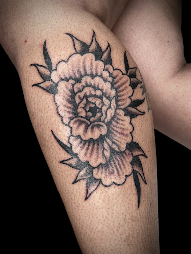 Explore womens neck tattoos ideas, creative tattoo ideas in Johnson City, available at Gold Cross Tattoo Co.