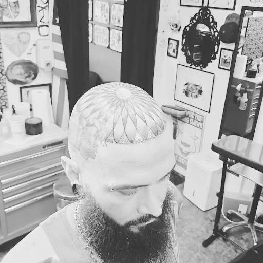 Explore shinedown tattoo ideas, creative tattoo ideas in Fredericksburg, available at Tattoo Haven