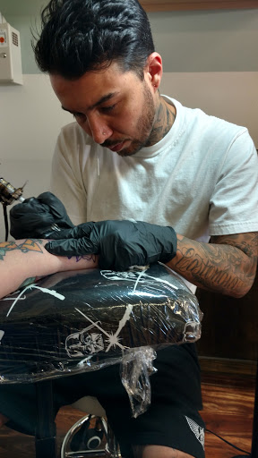 Explore western sleeve tattoo ideas, creative tattoo ideas in Portsmouth, available at DNA Tattoo