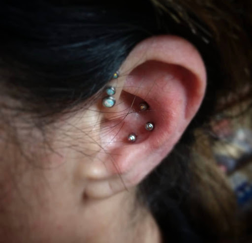 Explore green tattoo ideas, creative tattoo ideas in Pittsburgh, available at Pittsburgh Tattoo Company