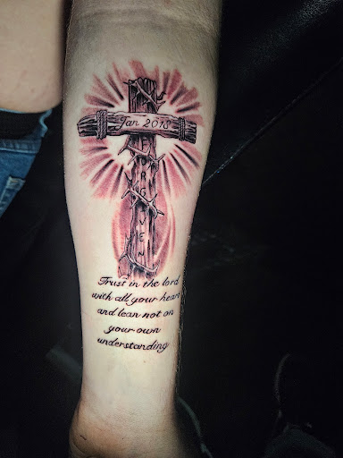 Explore tattoo ideas for aquarius, creative tattoo ideas in Angola, available at Hoodlum Ink