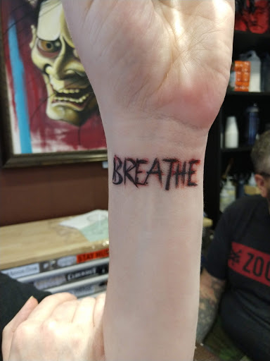 Explore small sister tattoo ideas, creative tattoo ideas in Powell, available at Tattoo Saga