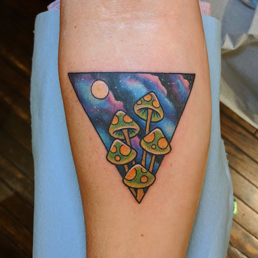Explore tattoo ideas for women's lower back, creative tattoo ideas in San Francisco, available at 13 Bats Tattoo and Piercing Studio