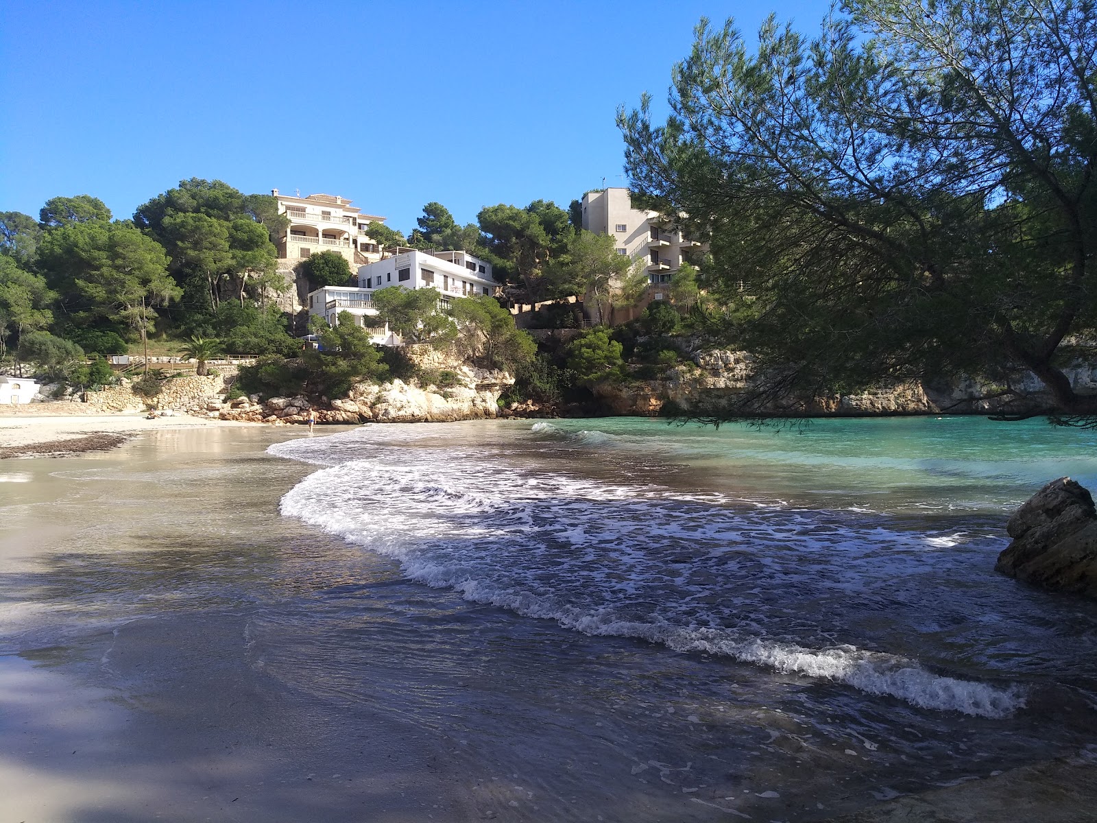 Photo of Santanyi Beach and the settlement