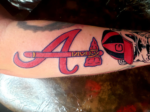 Explore small religious tattoo ideas, creative tattoo ideas in Bainbridge, available at Bainbridge Tattoo Company