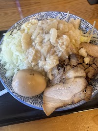 成りと