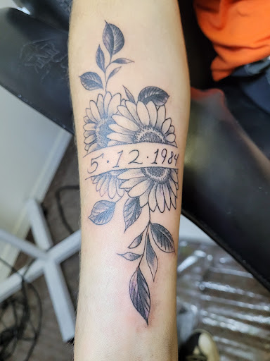 Explore unique tattoo ideas, creative tattoo ideas in Angola, available at Hoodlum Ink