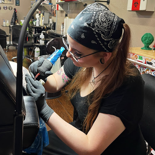 Explore leg tattoo ideas for men, creative tattoo ideas in Roanoke, available at Saint Cecilias Art Studio